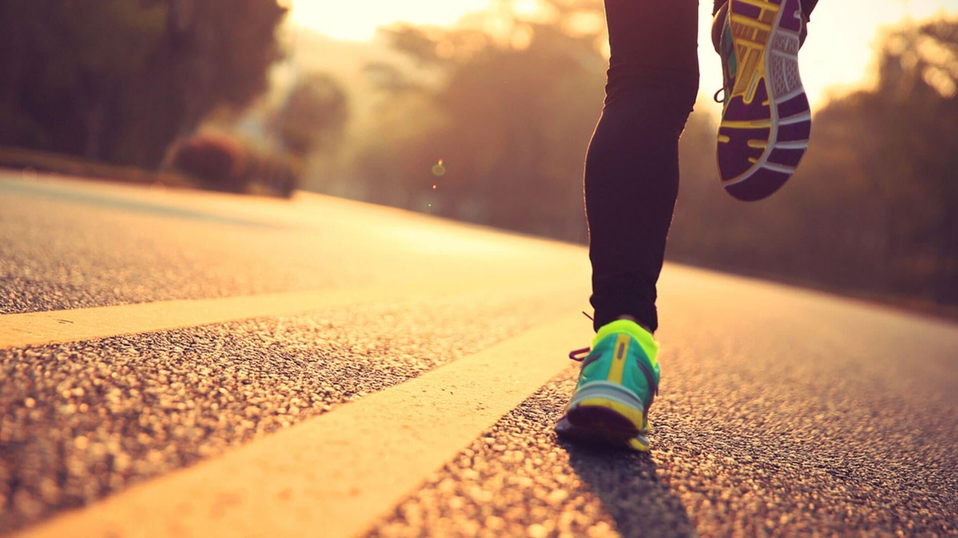 Runner protected by SolRX Waterblock sunscreen on a morning run