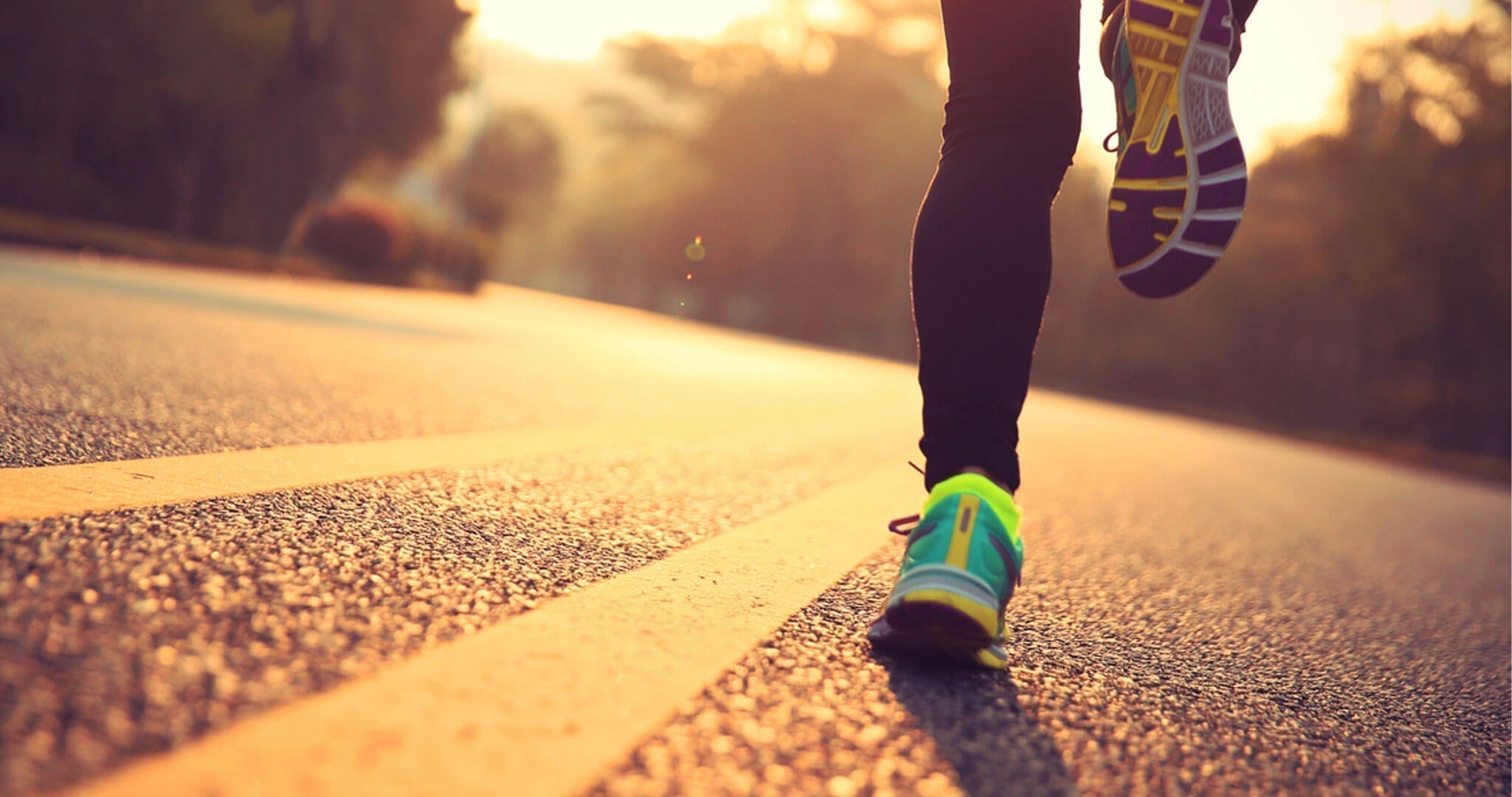Runner protected by SolRX Waterblock sunscreen on a morning run