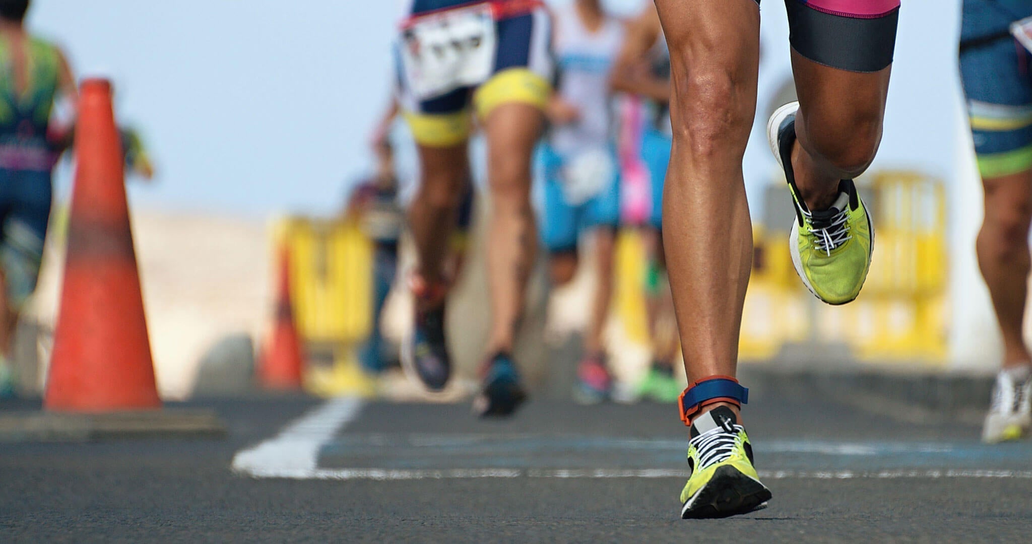 Triathletes with SolRX sunscreen applied for race day protection